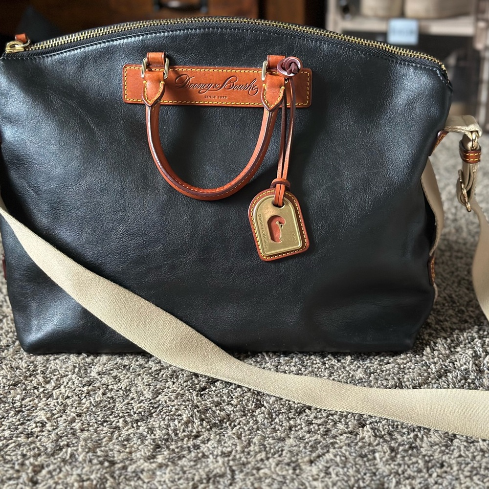 Stylish Dooney and Bourke  Black Leather and brown combo cross body tote Bag.